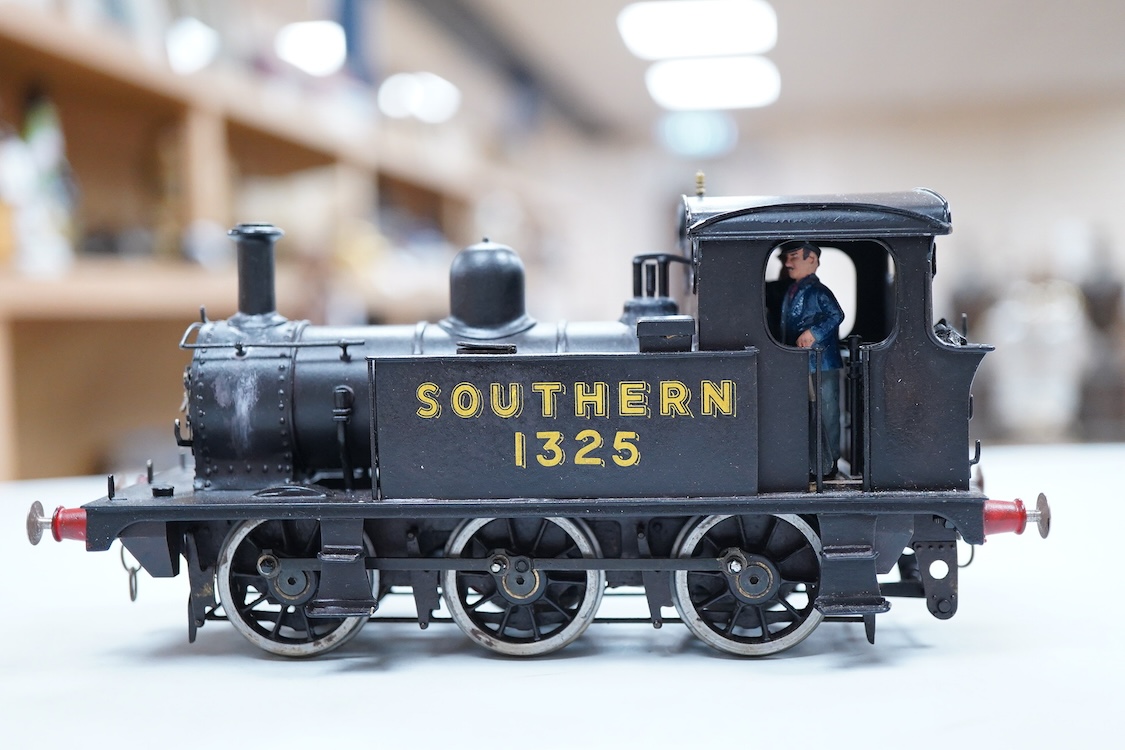 An 0 gauge scratch built model railway locomotive by John Worsley, a Southern Railway P class 0-6-0T, 1325, a detailed model with opening smoke box door showing the details of the blast pipe and boiler tube ends, sprung